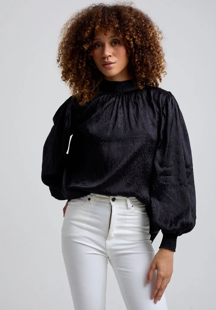 Molly Turtle Neck Animal Blouse In Black